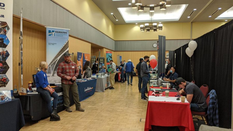 Company booths lined up to offer students internships and jobs.