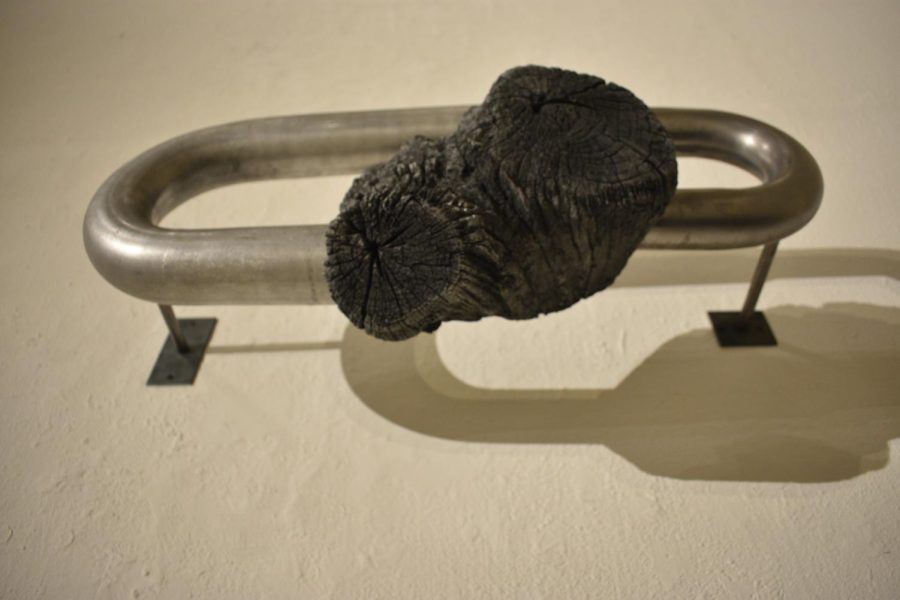 Metal and wood harmonize in the work of Cozette Philips. 